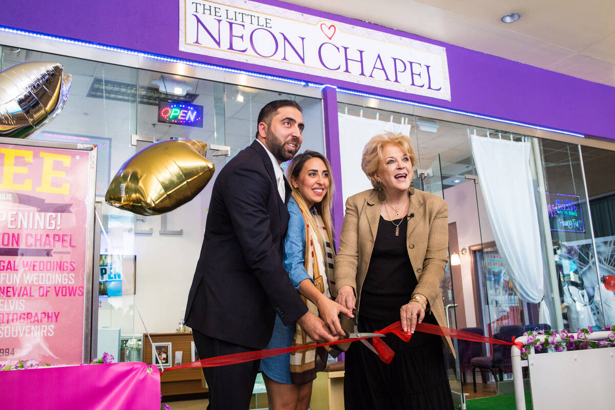 Minister and Little Neon Chapel owner Ben Silvano, left, Silvano's sister Sara El Hage, center ...