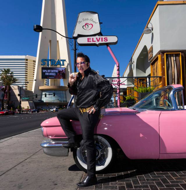 Elvis tribute artist Jesse Garon poses with his 1960 Cadillac outside of the Little Chapel of H ...