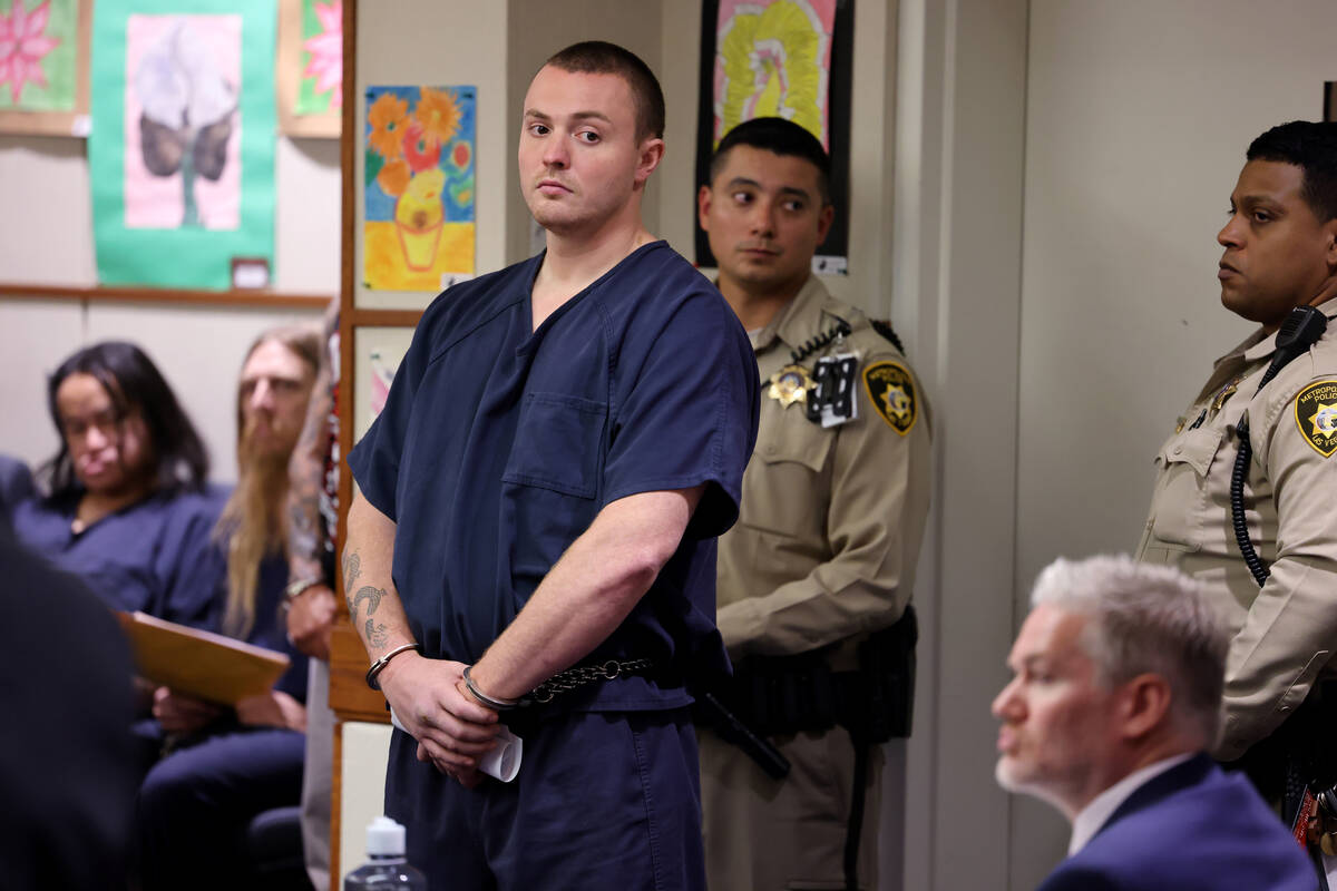 Russell Smith, 26, during his initial court appearances in Henderson Justice Court on Thursday, ...