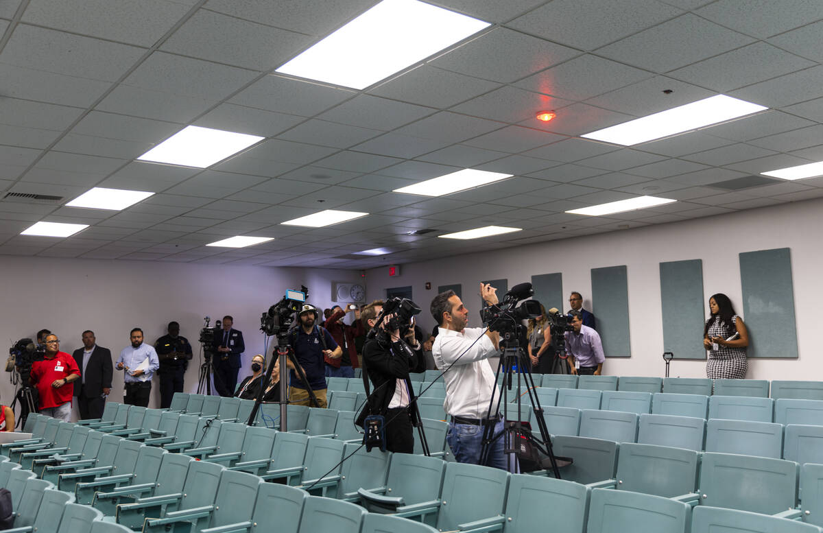 Journalists record as school officials look on during a lockdown demonstration at an event mark ...