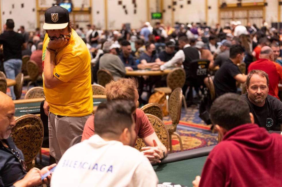 Jonathan Nassar waits for the cards to be revealed while playing during the World Series of Pok ...