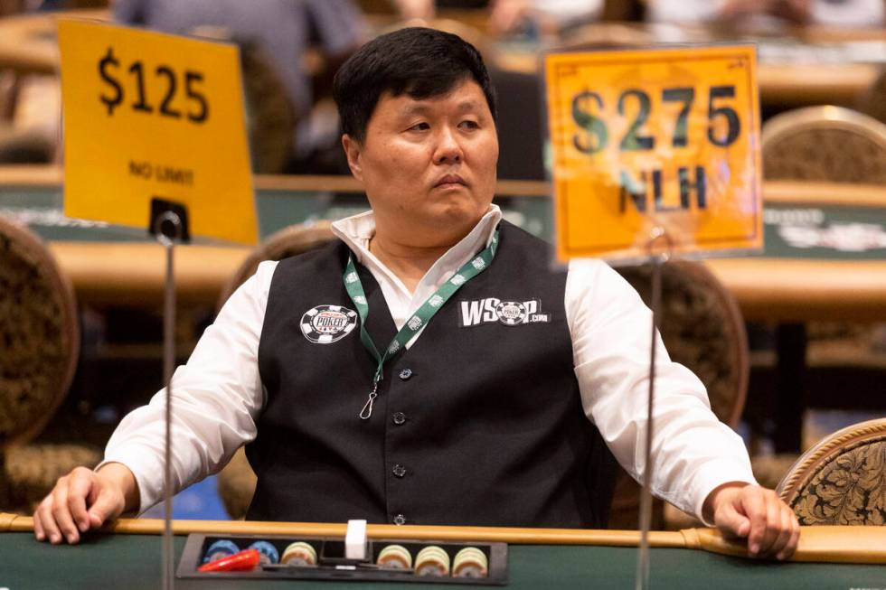 Dealer John Bong waits for players to sit at his table during the World Series of Poker "H ...