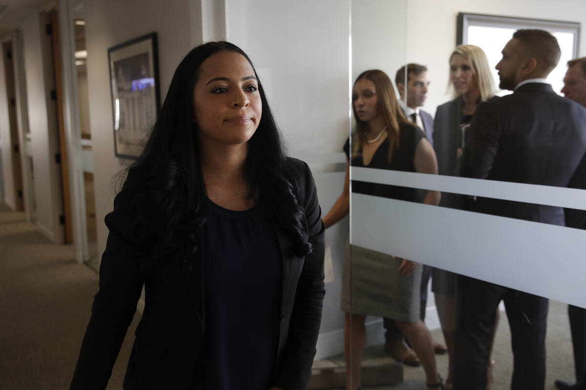 Former Olympic gymnast Tasha Schwikert leaves a conference room after speaking to reporters Mon ...