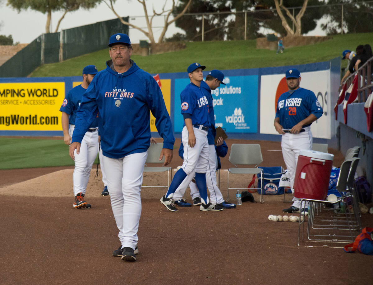 Las Vegas 51s pitching coach Frank Viola (16) walks on the field before their game against the ...
