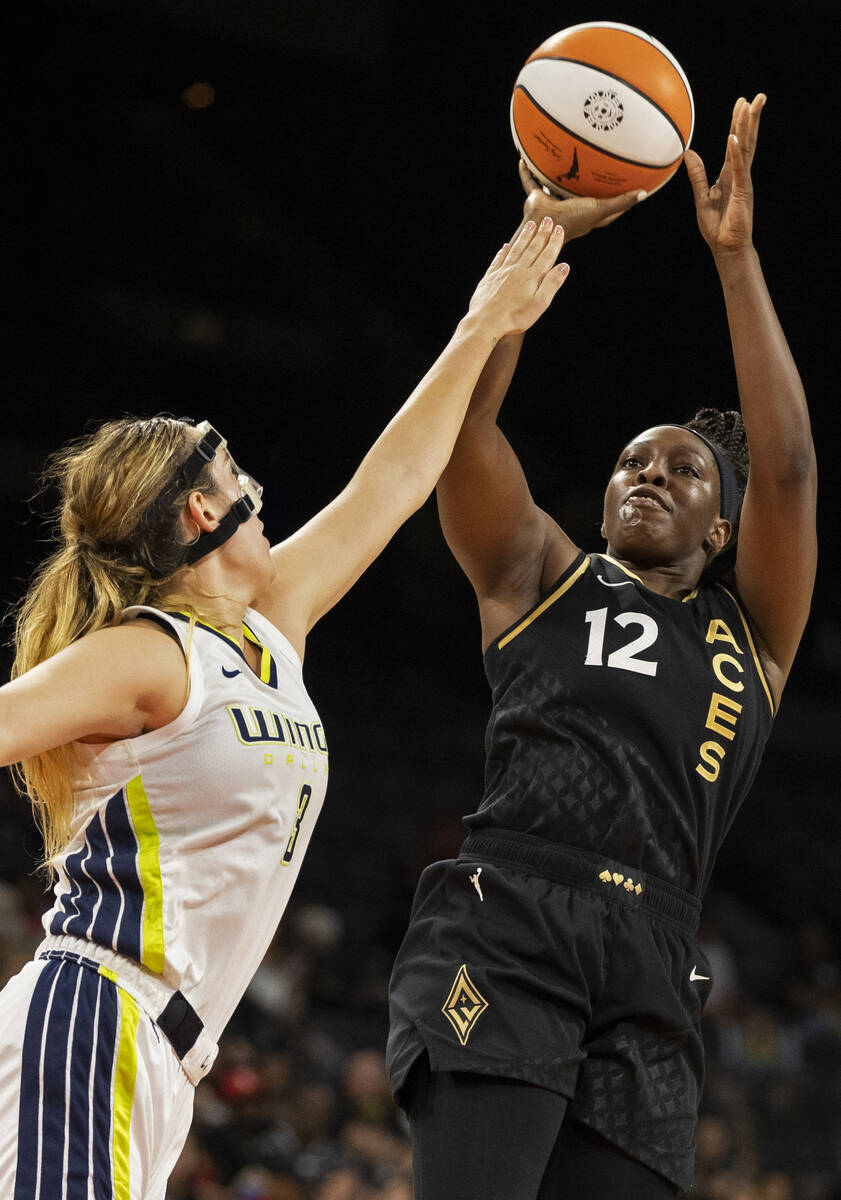 Aces guard Chelsea Gray (12) shoots over Dallas Wings guard Marina Mabrey (3) in the second hal ...