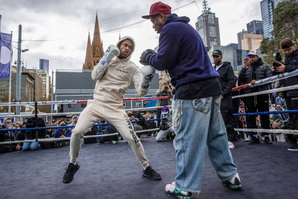 American boxer Devin Haney boxes during a public training session at Federation Square in Melbo ...