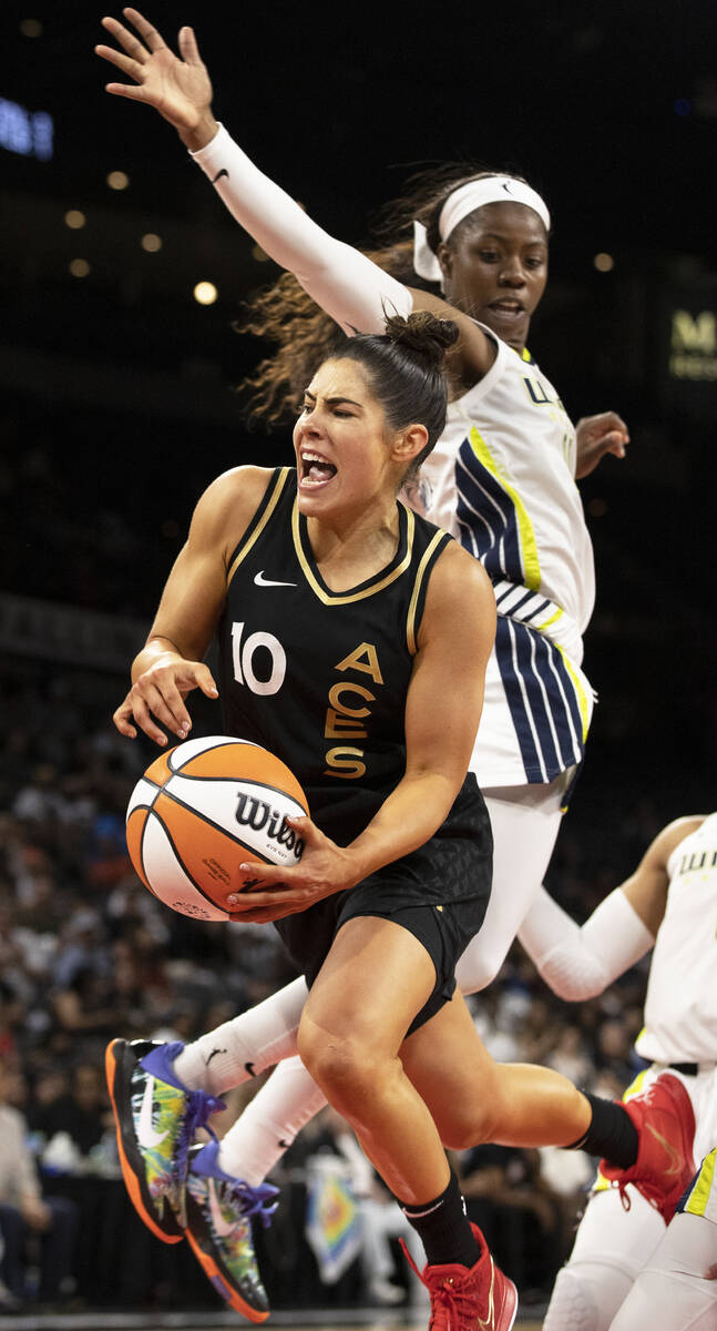 Aces guard Kelsey Plum (10) is fouled on the way to the rim in the second half during a WNBA ba ...