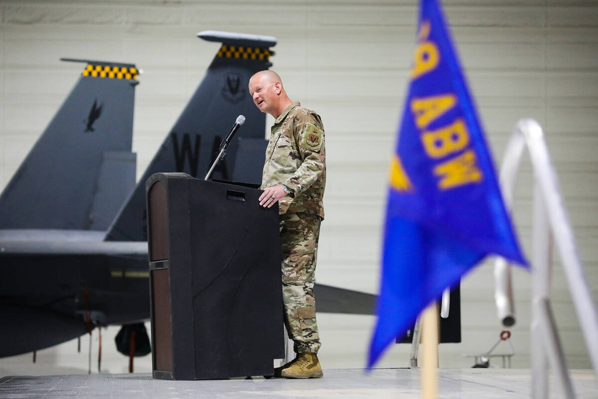 Col. Joshua DeMotts addresses the audience at a ceremony after he took command of the 99th Air ...