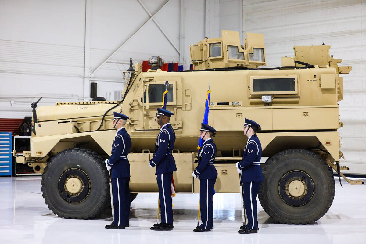 The Air Force honor guard waits to enter the state for an assumption of command ceremony at Nel ...
