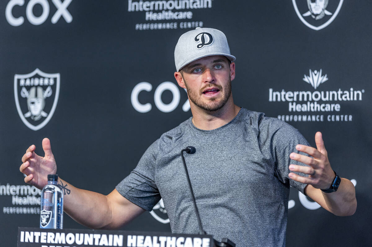 Raiders quarterback Derek Carr talks during minicamp practice at the Raiders headquarters withi ...