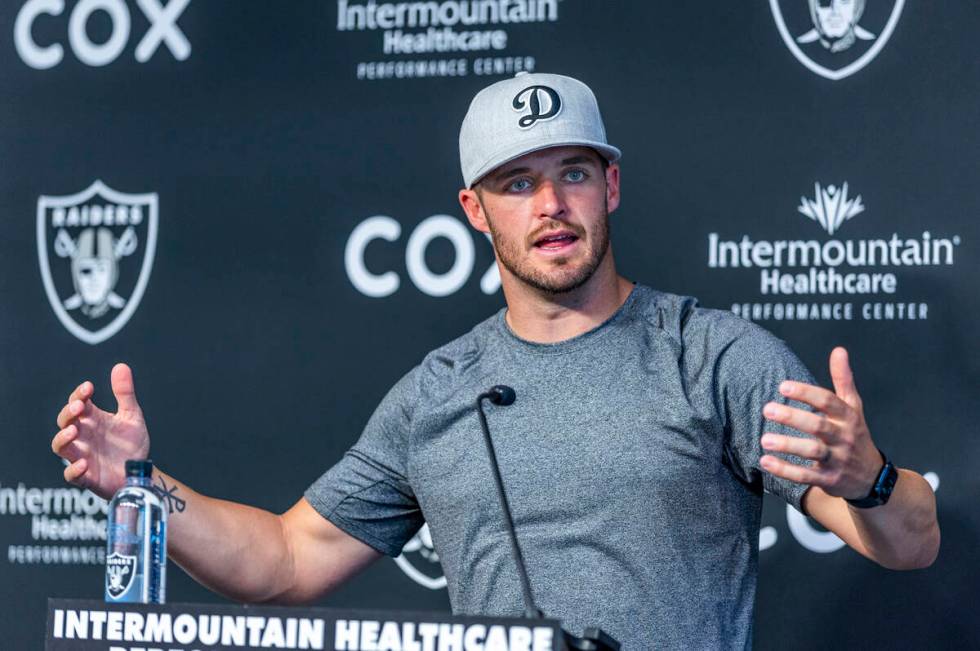 Raiders quarterback Derek Carr talks during minicamp practice at the Raiders headquarters withi ...