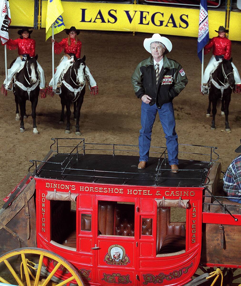 IN-DEPTH, HISTORY OF RODE0, NFR Manager of Production, Shawn Davis stands atop the Bininon's Ho ...