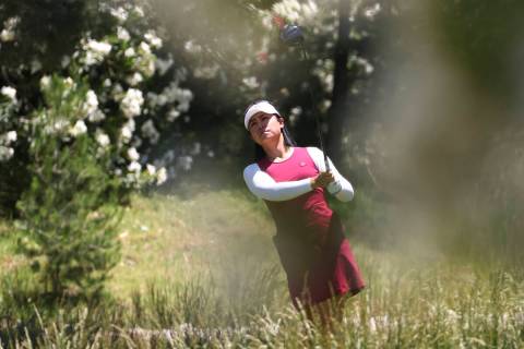In this May 25, 2022, file photo, Danielle Kang tees off at the 12th hole while playing against ...
