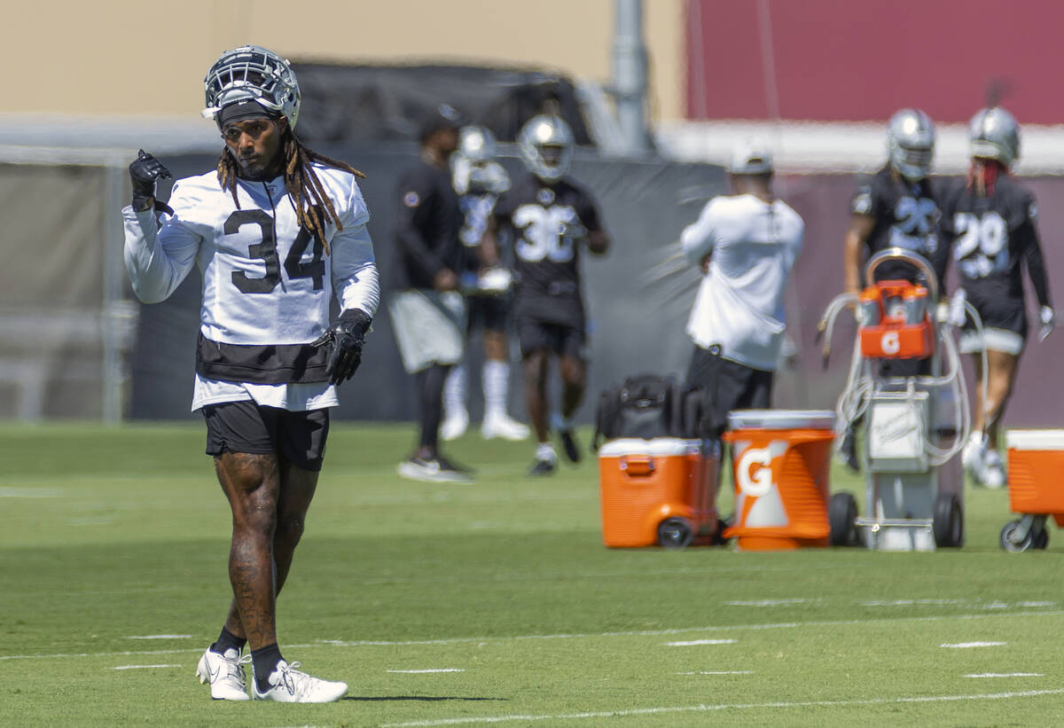 Raiders running back Brandon Bolden (34) looks to a coach during minicamp practice at the Raide ...