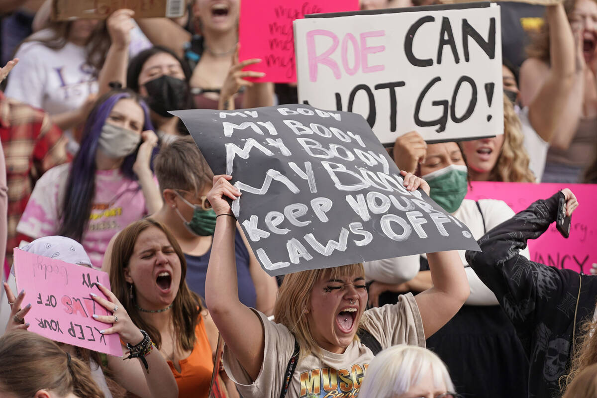 In this May 5, 2022, file photo, people attend an abortion-rights rally at the Utah State Capit ...