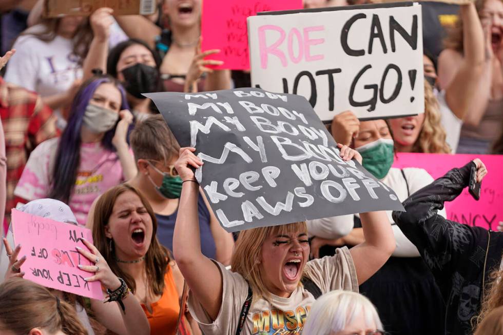 In this May 5, 2022, file photo, people attend an abortion-rights rally at the Utah State Capit ...