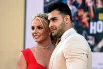 FILE - Britney Spears and Sam Asghari arrive at the Los Angeles premiere of "Once Upon a Time i ...