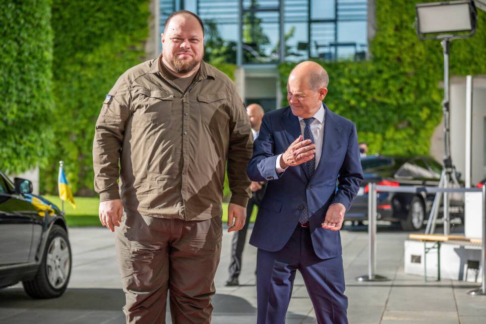 FILE - German Chancellor Olaf Scholz, right, welcomes Ukrainian Parliament Speaker Ruslan Stefa ...