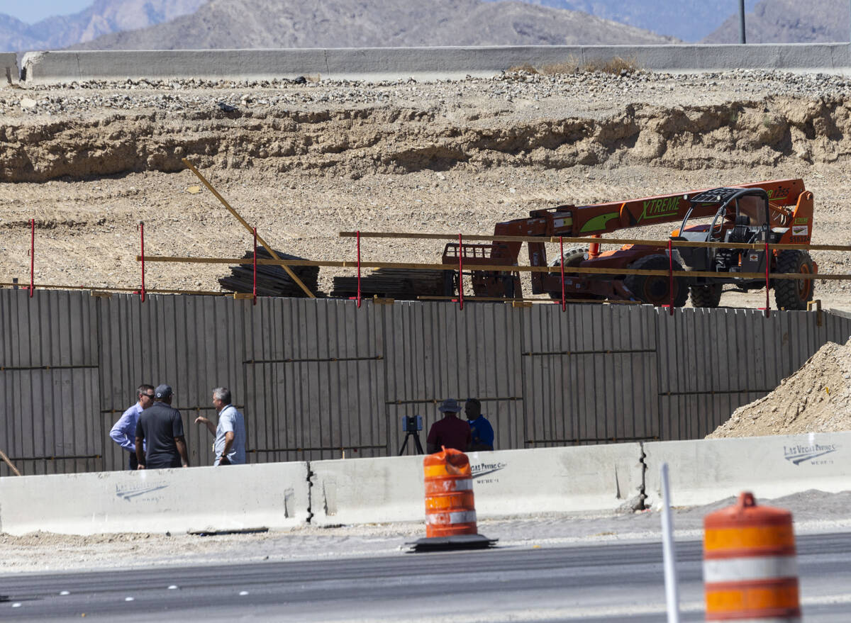 Las Vegas police investigate after a large beam at a construction project fell on top of a vehi ...