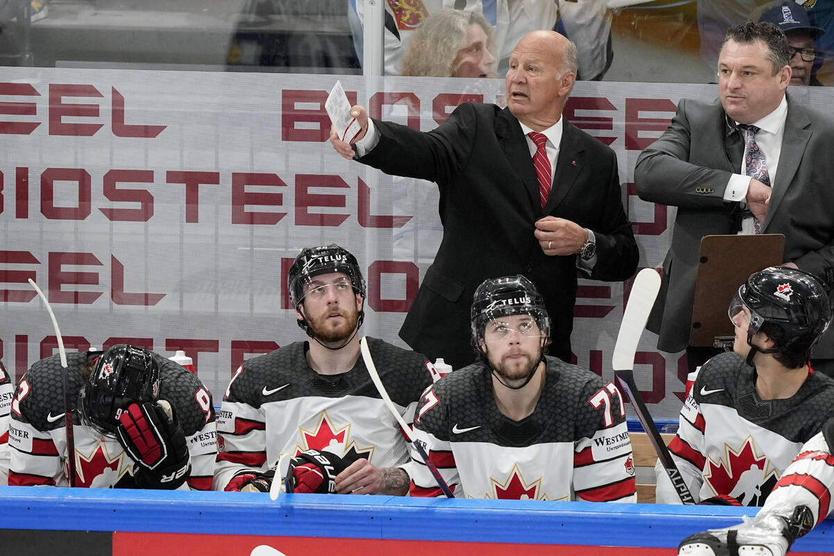Canada's head coach Claude Julien watches play during the Hockey World Championship final match ...