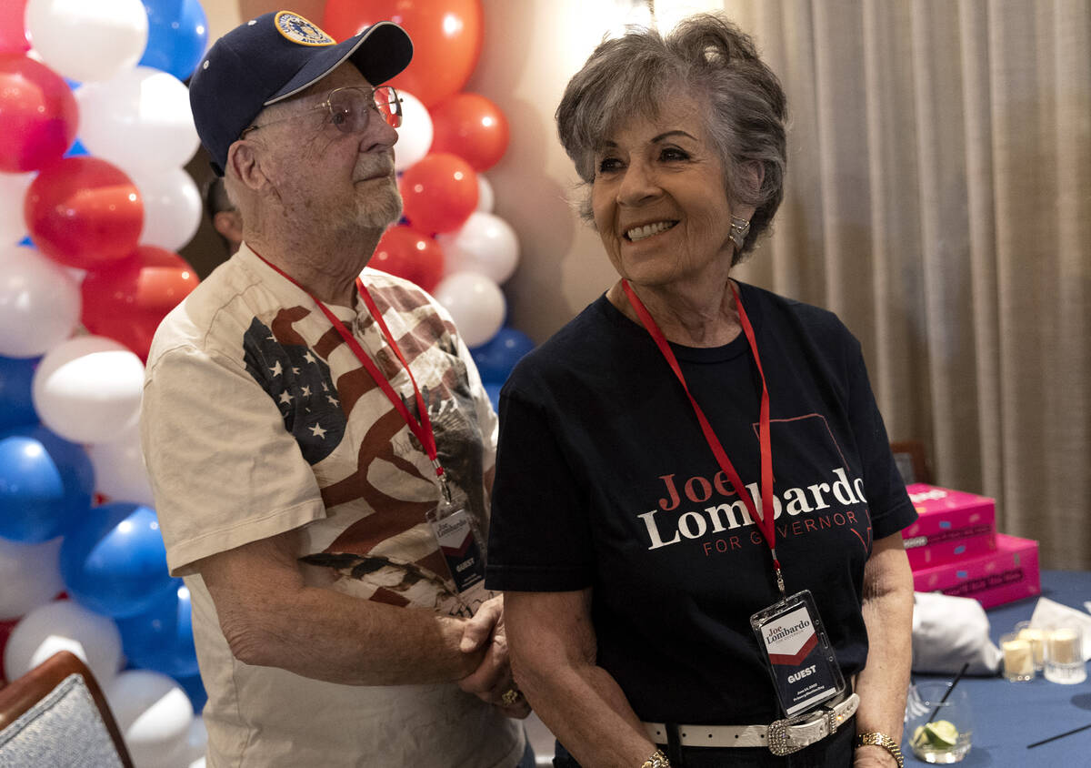 Guests react as Republican candidate for Nevada governor Joe Lombardo speaks after results indi ...