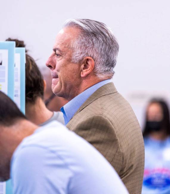 Sheriff Joe Lombardo pauses while voting during the Nevada primary election at Veterans Memoria ...