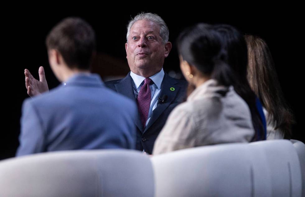 Former vice president Al Gore, middle, founder and chairman of The Climate Reality Project, spe ...