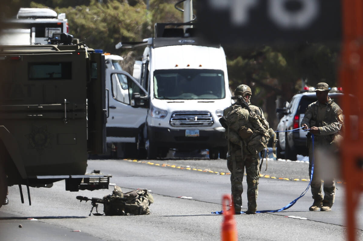 Las Vegas police work a barricade situation on Durango Drive on Monday, June 13, 2022, in Las V ...