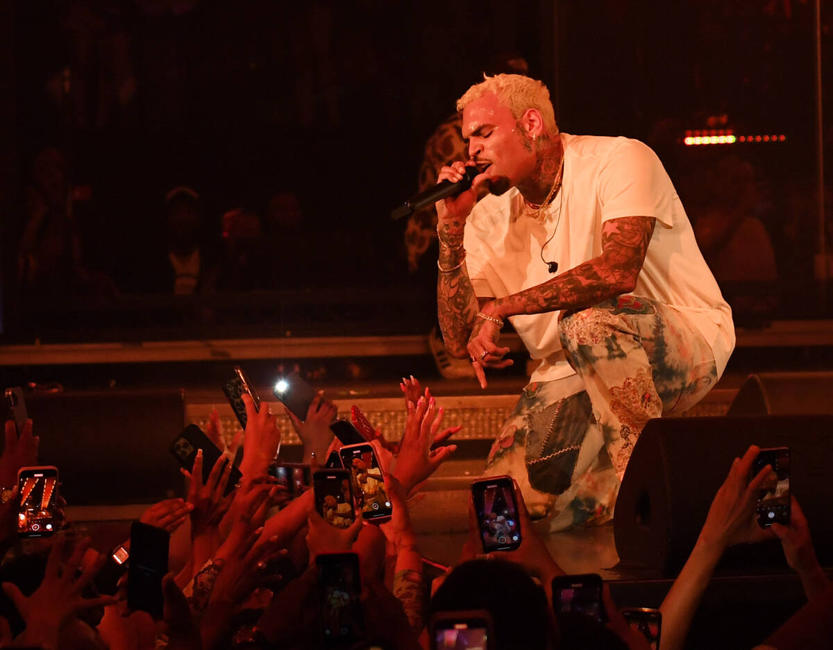 LAS VEGAS, NEVADA - JUNE 11: Singer/songwriter Chris Brown performs during the first show of hi ...