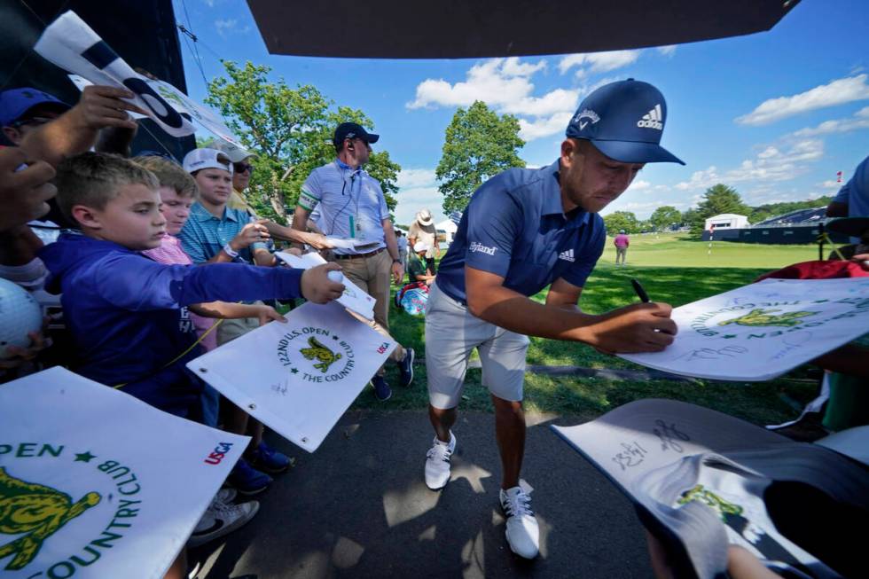 Xander Schauffele gives autographs at The Country Club, Monday, June 13, 2022, in Brookline, Ma ...