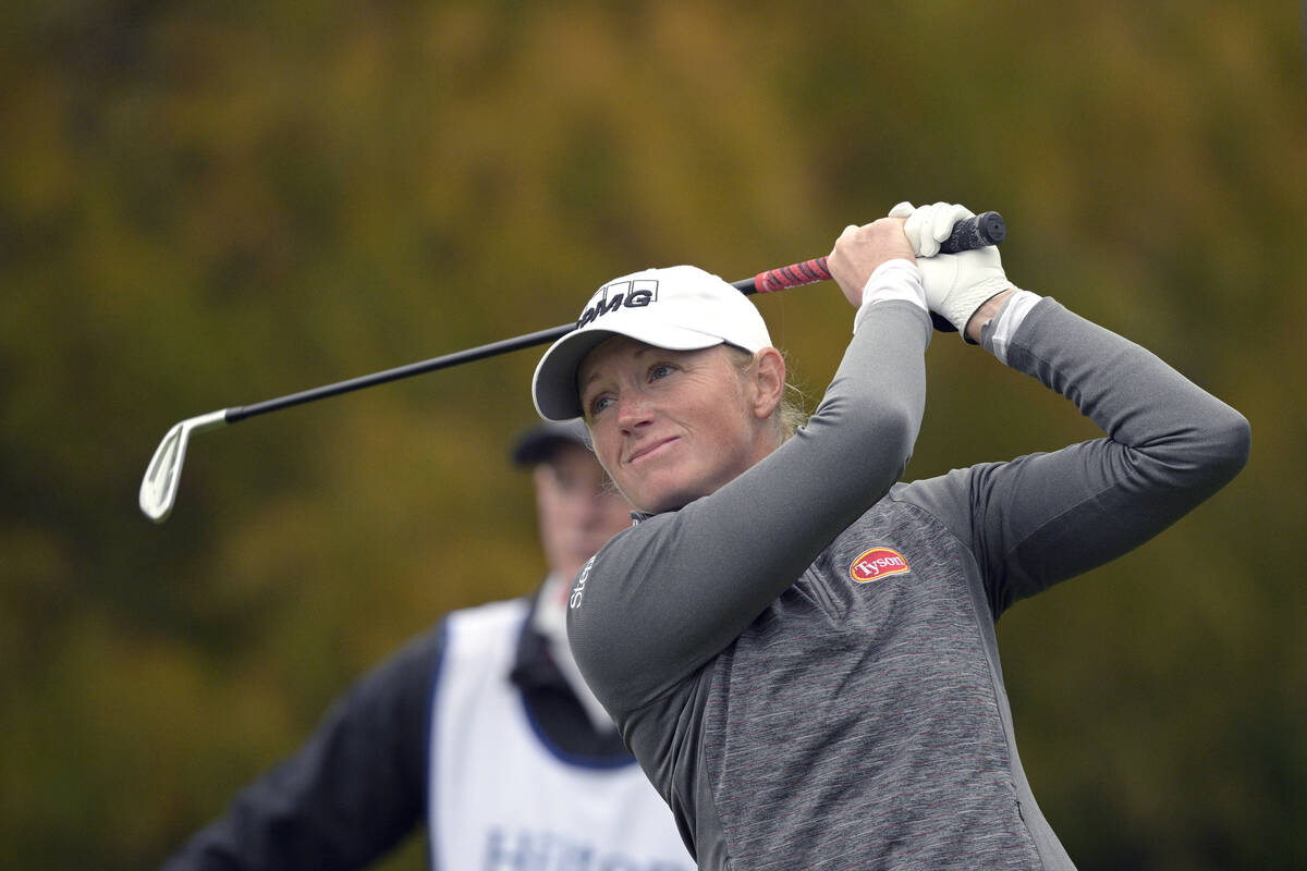 Stacy Lewis watches her tee shot on the 17th hole during the third round of the Tournament of C ...
