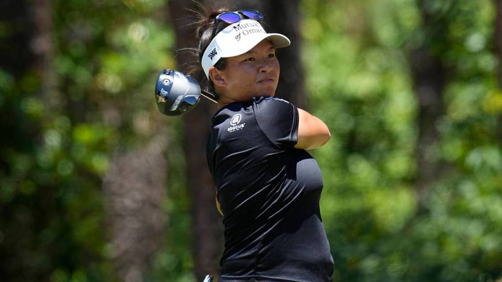Megan Khang hits off the first tee during the third round of the U.S. Women's Open golf tournam ...