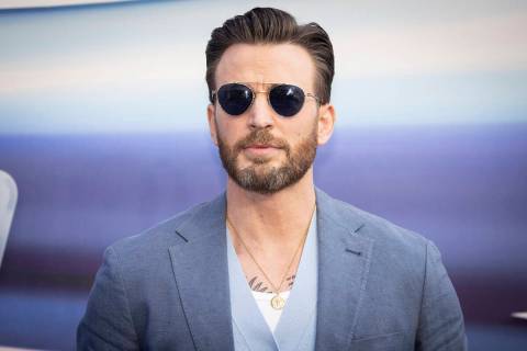 Chris Evans poses for photographers upon arrival for the premiere of the film 'Lightyear' in Lo ...