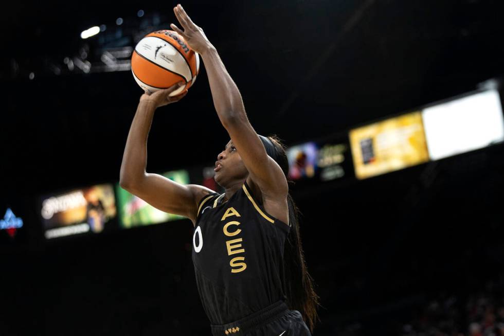 Las Vegas Aces guard Jackie Young (0) shoots against the Connecticut Sun during the second half ...