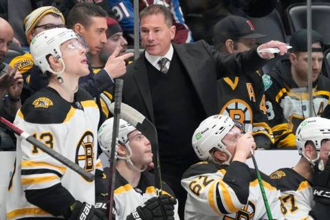 Boston Bruins head coach Bruce Cassidy, right, directs his players in the second period of an N ...