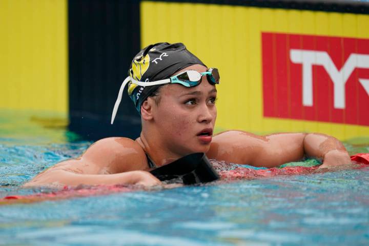 Bella Sims reacts after competing in the women's 400-meter IM prelim at the TYR Pro Swim Series ...