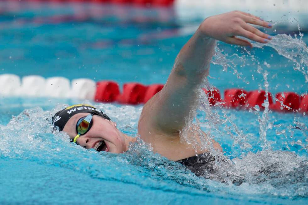 Claire Weinstein competes in the women's 100-meter prelim at the TYR Pro Swim Series swim meet ...