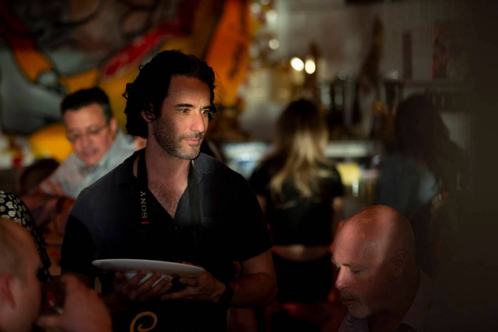 Tasting Collective founder Nat Gelb talks to diners at Valencian Gold during the inaugural Las ...