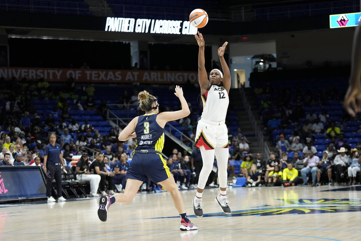 Chelsea Gray #12 of the Las Vegas Aces shoots a three point basket during the game against the ...