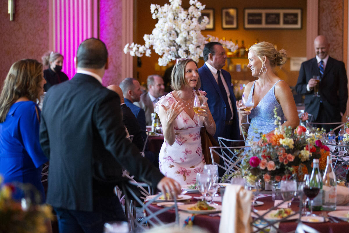 People attend the Las Vegas Philharmonic’s fundraising event at the The Smith Center for ...