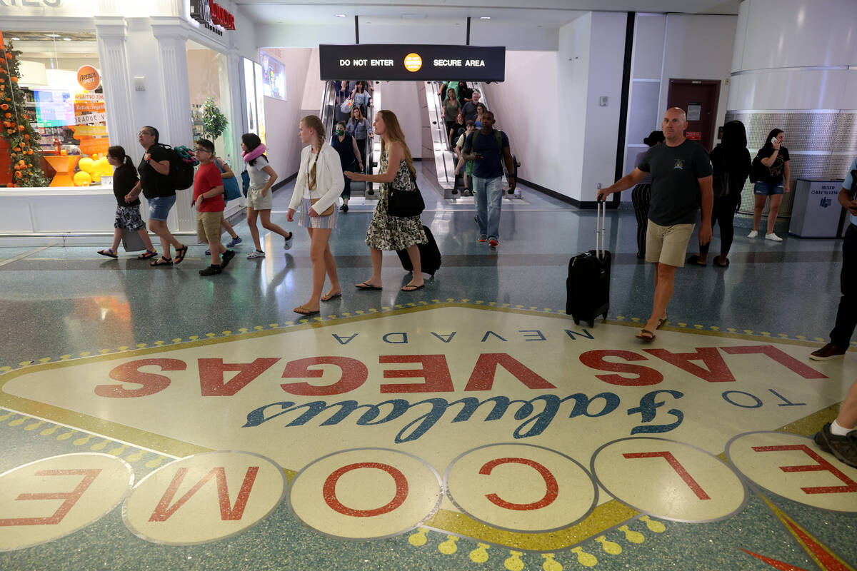 Passengers in baggage claim in Terminal 1 at Harry Reid International Airport Wednesday, June 1 ...