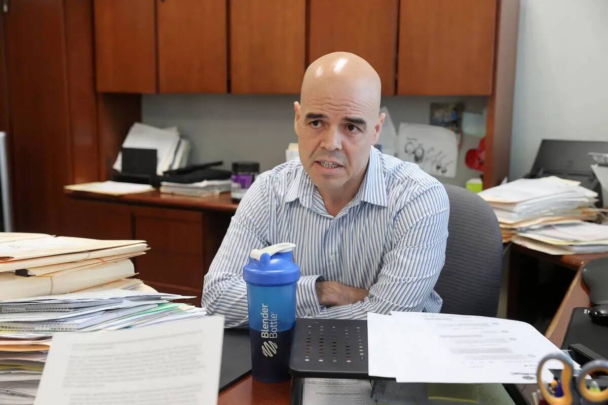 Clark County Public Administrator Robert Telles talks to a reporter in his Las Vegas office Wed ...