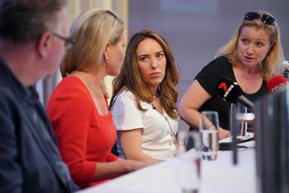 From left, NUJ official Tim Dawson, WikiLeaks founder Julian Assange's lawyer Jennifer Robinson ...