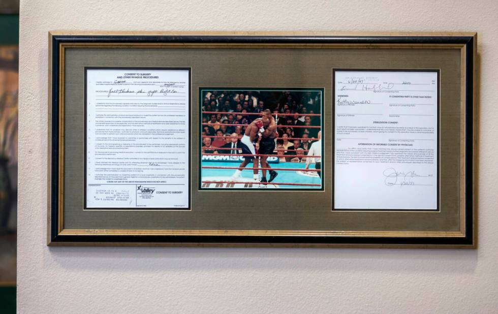 Dr. Julio Garcia was the plastic surgeon who fixed Evander Holyfield's ear. He keeps a photo of ...