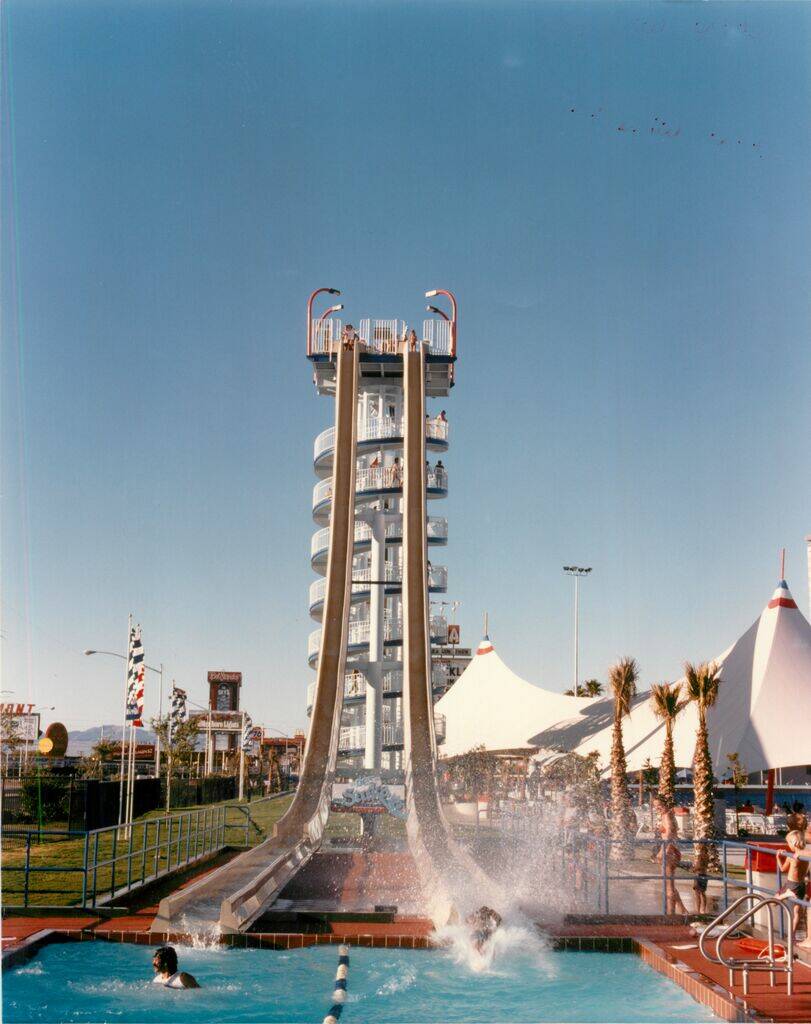 A rider hits the water after sliding down a ride at Wet 'n' Wild on Las Vegas Boulevard in 1988 ...