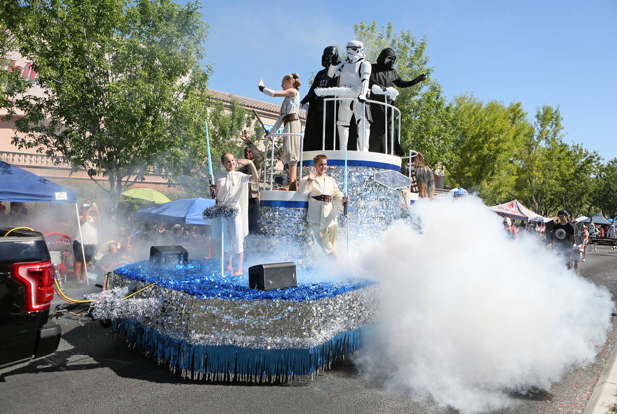 A Star Wars-themed float presented by the Neon City Garrison chapter of the 501st Legion is sho ...