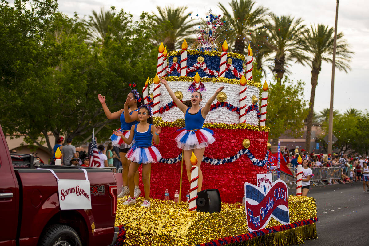 Young performers celebrate America's birthday with a cake during the 2015 Summerlin Council Pat ...