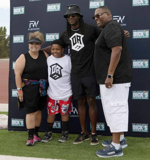 Raiders wide receiver Davante Adams, second from right, poses with, from left, Connie, Carmine ...