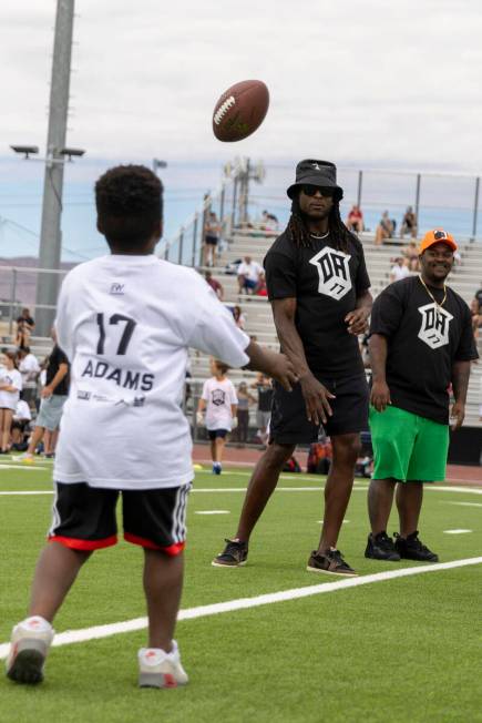 Raiders wide receiver Davante Adams participates in his youth football camp at Spring Valley Hi ...