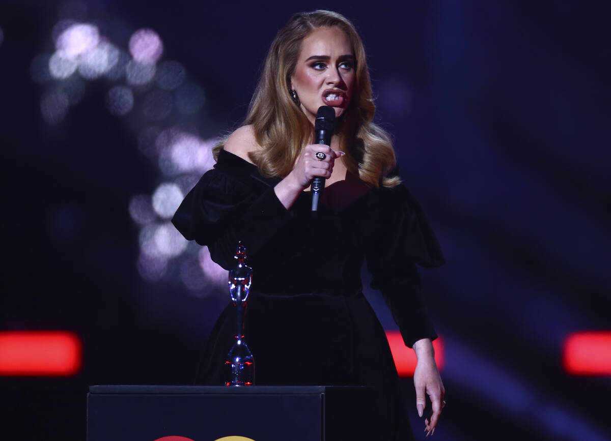 Adele on stage to accept her award for Artist of the Year at the Brit Awards 2022 in London Tue ...
